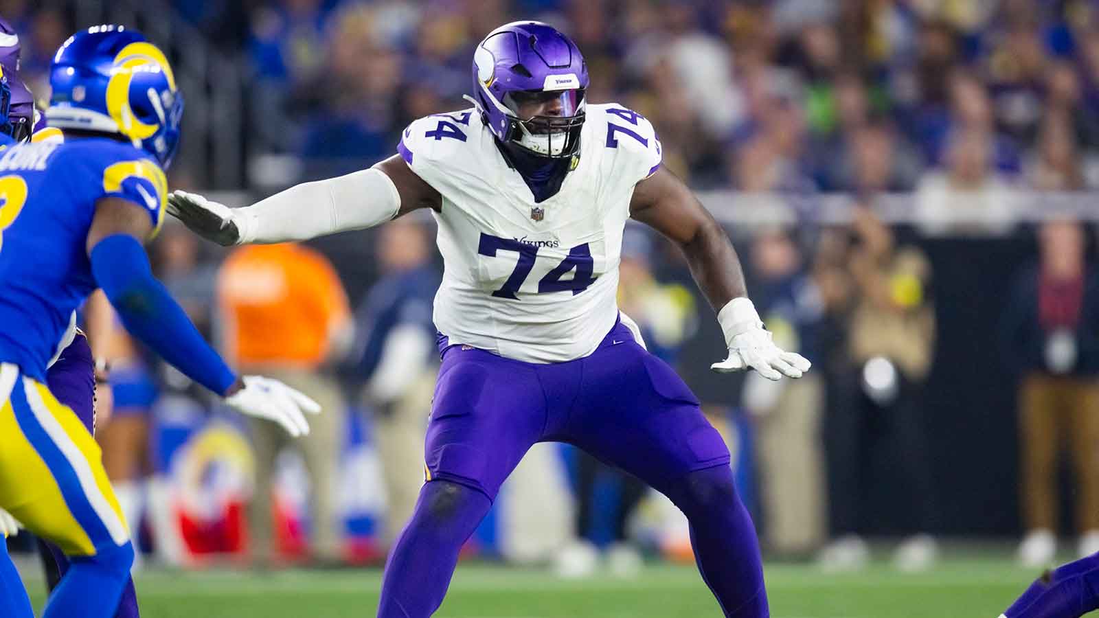 Minnesota Vikings tackle Cam Robinson (74) against the Los Angeles Rams during an NFC wild card game at State Farm Stadium. 