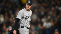 New York Yankees starting pitcher Cam Schlittler (31) walks off the field after being pulled from the game during the seventh inning against the Seattle Mariners at T-Mobile Park.