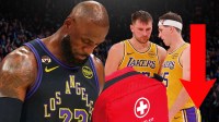 Lakers' LeBron James sad next to Luka Doncic, Austin Reaves injured