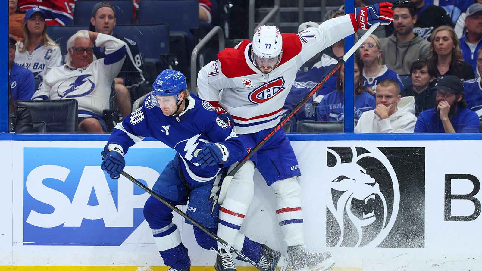 Canadiens’ Kirby Dach supported by teammates after Game 2 OT blunders
