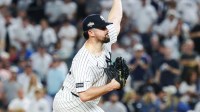 New York Yankees starting pitcher Carlos Rodon (55) delivers a pitch against the Toronto Blue Jays in the first inning during game three of the ALDS round for the 2025 MLB playoffs at Yankee Stadium.