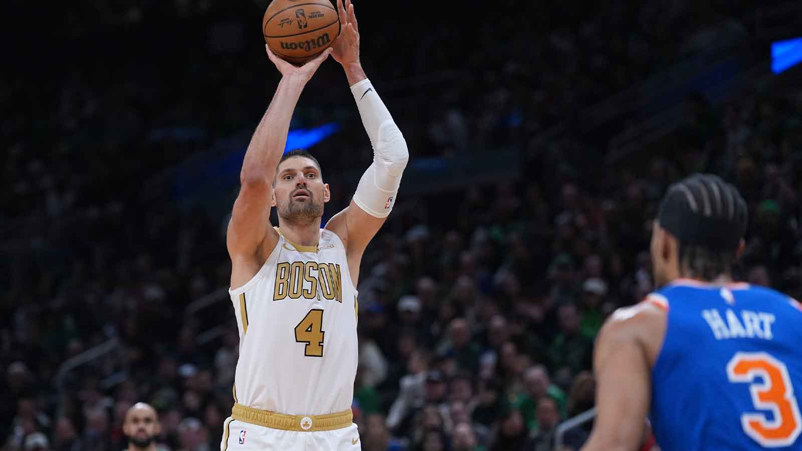 Celtics center Nikola Vucevic (4) shoots the ball against the New York Knicks in the second half at TD Garden