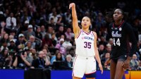Connecticut guard Azzi Fudd (35) makes a three-pointer against South Carolina at Mortgage Matchup Center during the Women's Final Four in Phoenix on April 3, 2026.