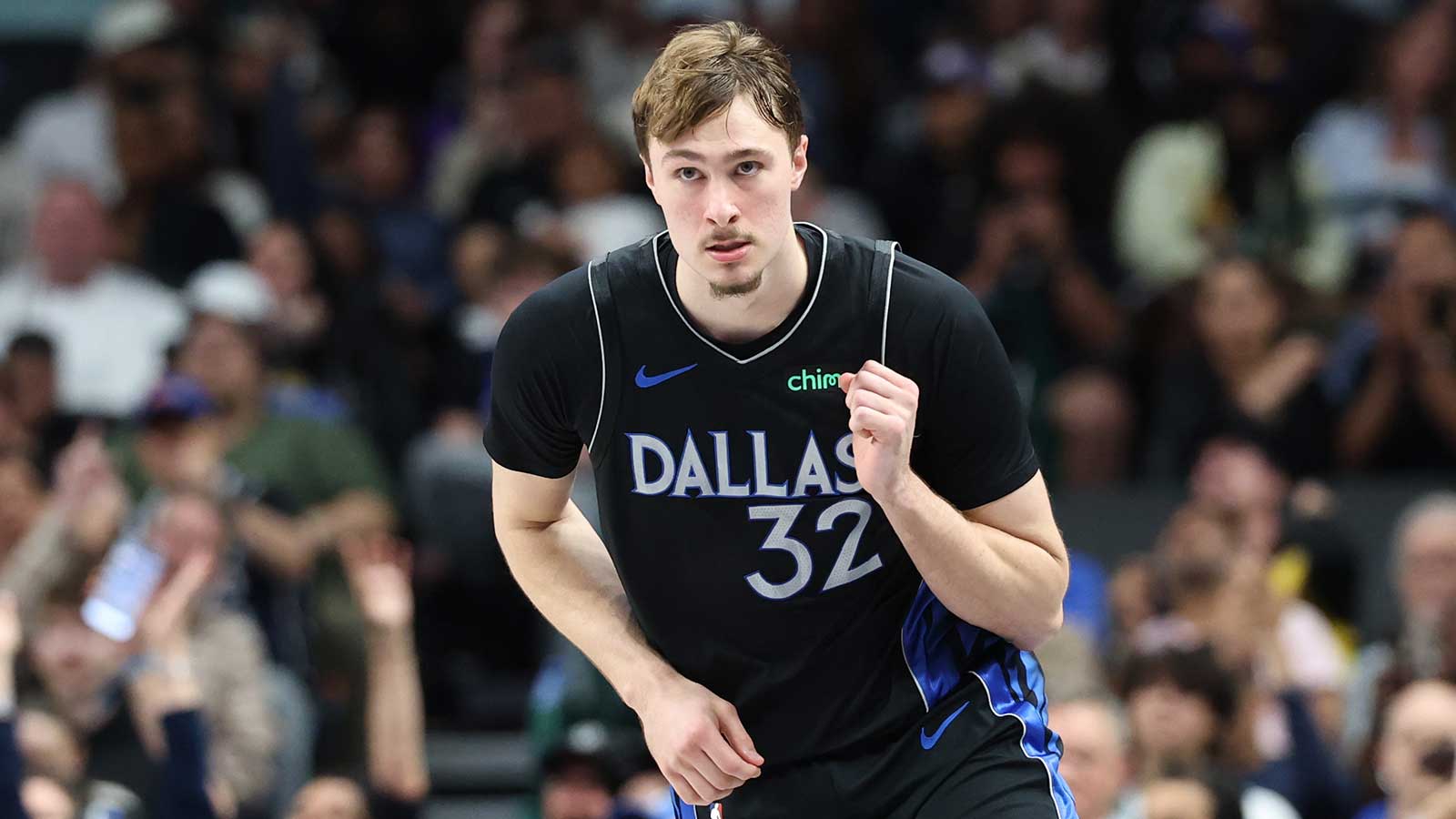 Dallas Mavericks forward Cooper Flagg (32) reacts after scoring against the Los Angeles Lakers during the second half at American Airlines Center.
