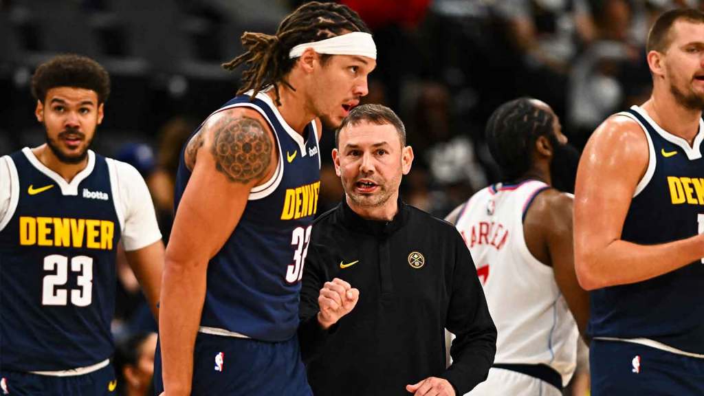 Denver Nuggets Head Coach David Adelman talks with Denver Nuggets forward Aaron Gordon (32) against the Los Angeles Clippers during the second quarter at Intuit Dome.
