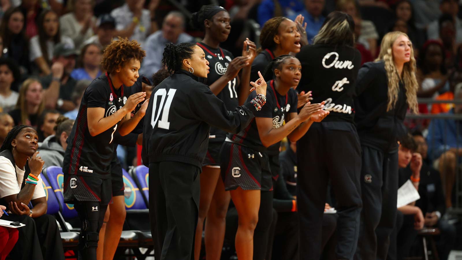 South Carolina Gamecocks head coach Dawn Staley and the bench react in the third quarter against the UCLA Bruins during the National Championship game of the women's 2026 NCAA Tournament at Mortgage Matchup Center.