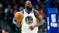 Golden State Warriors forward Draymond Green (23) dribbles against the Dallas Mavericks during the second half at American Airlines Center.