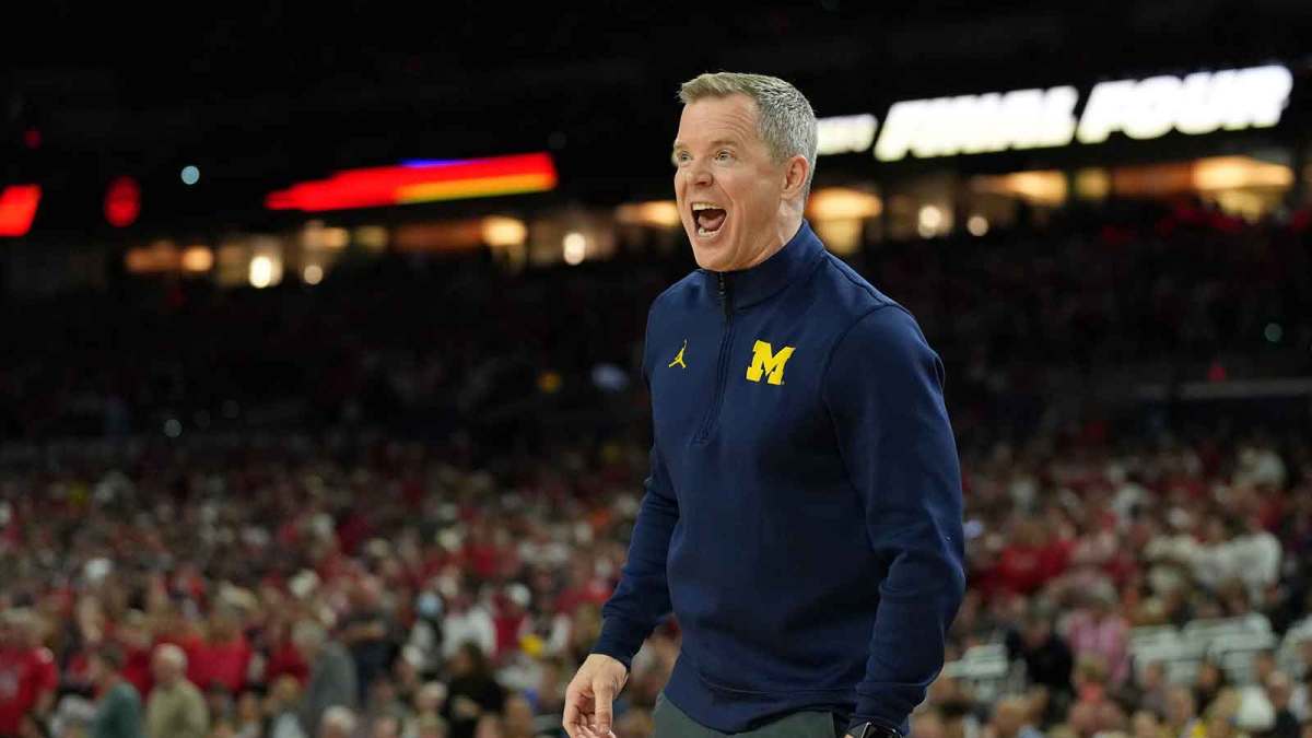 Michigan Wolverines head coach Dusty May reacts during the second half in a semifinal of the Final Four of the men's 2026 NCAA Tournament at Lucas Oil Stadium.