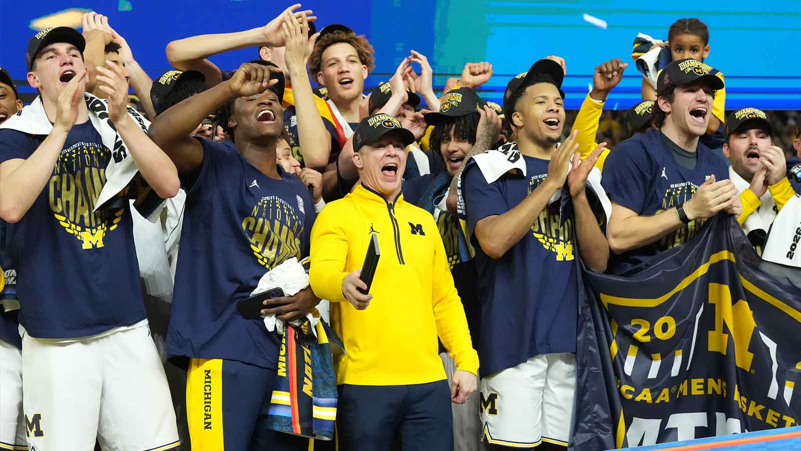 https://wp.clutchpoints.com/wp-content/uploads/2026/04/Dusty-May-and-the-Michigan-Wolverines-celebrating-national-championship-win.jpg