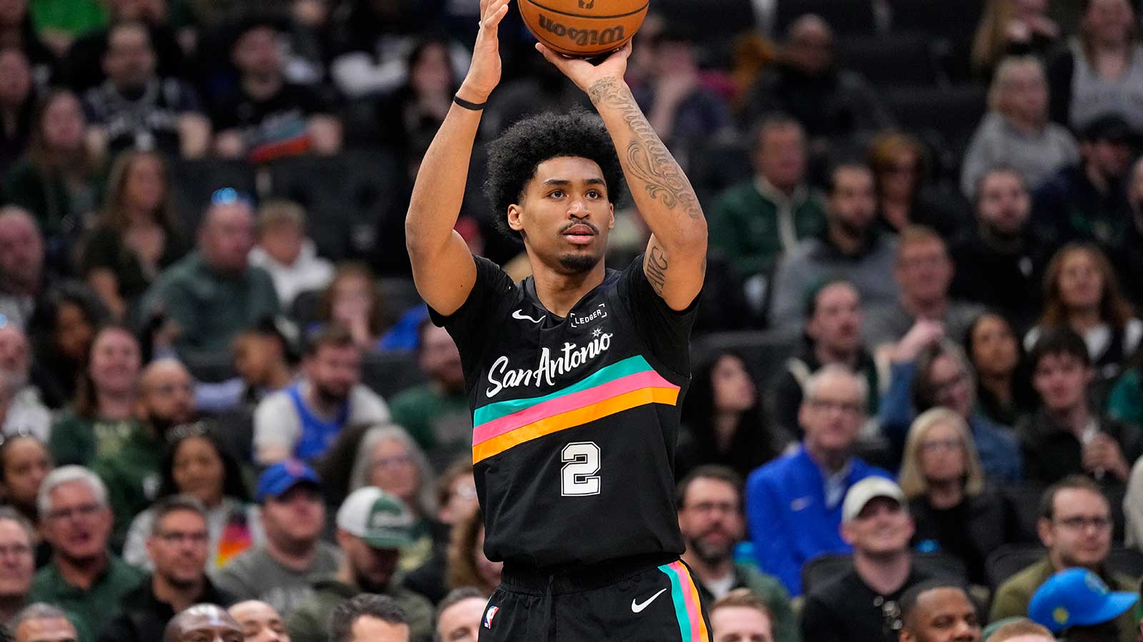 San Antonio Spurs guard Dylan Harper (2) shoots during the second quarter against the Milwaukee Bucks at Fiserv Forum.