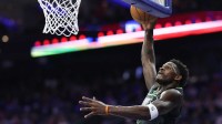 Minnesota Timberwolves guard Anthony Edwards (5) drives unsuccessfully for a dunk against the Philadelphia 76ers during the third quarter at Xfinity Mobile Arena.