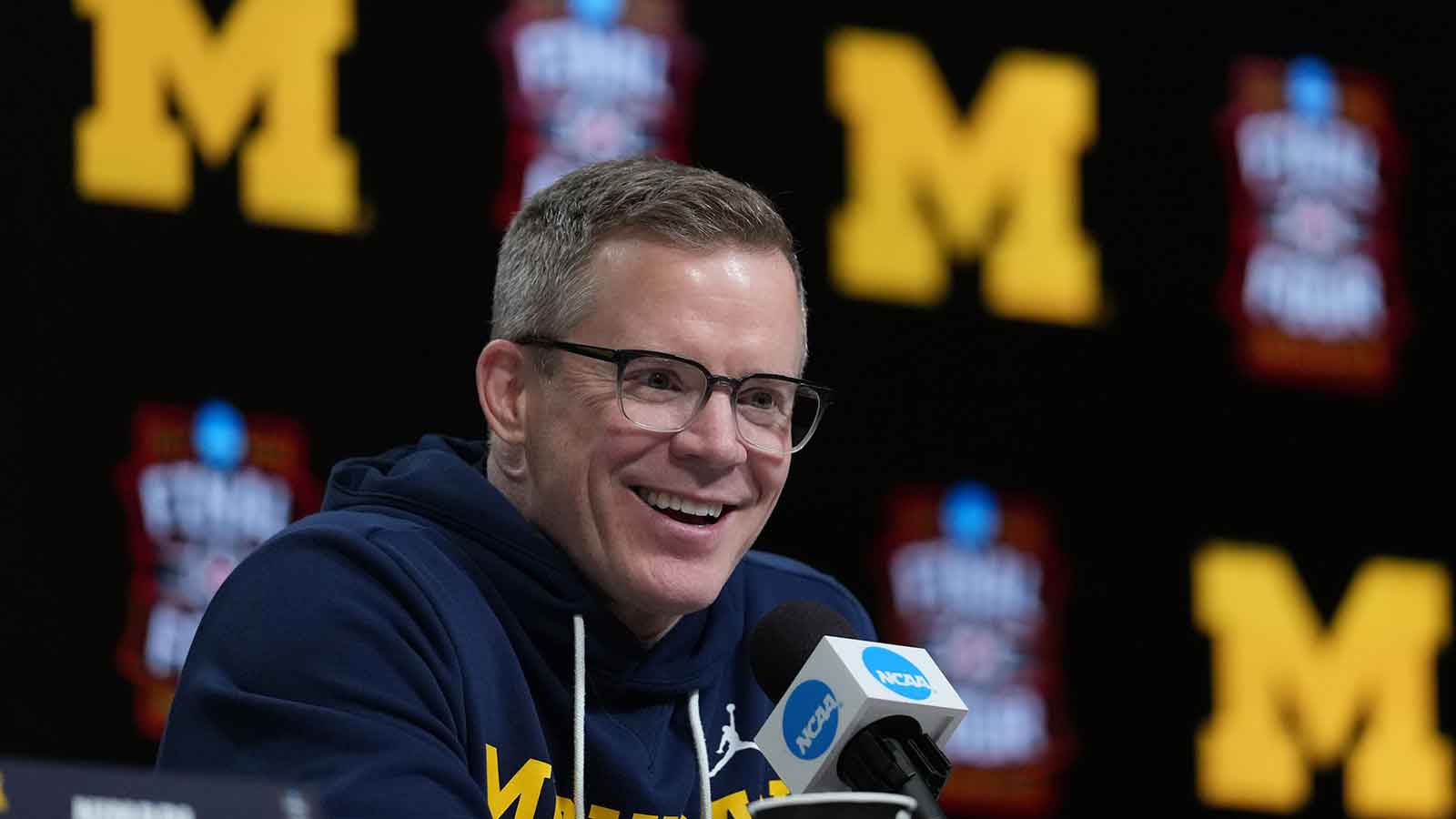 Fans give Michigan HC Dusty May his flowers after topping Dan Hurley’s UConn