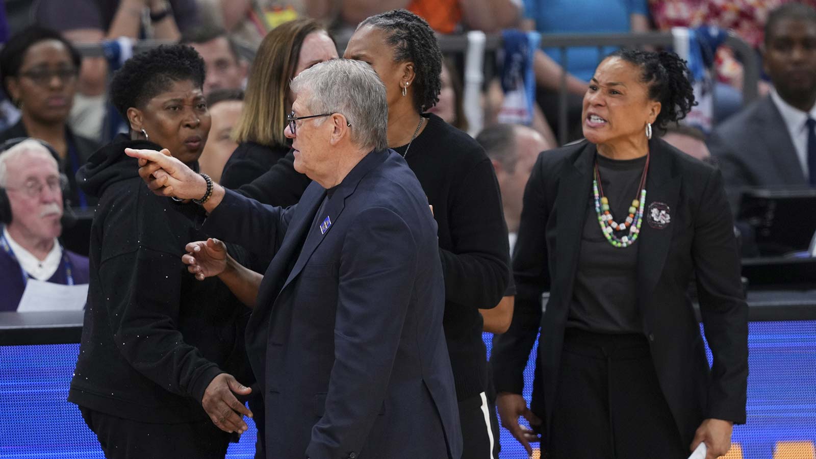 https://wp.clutchpoints.com/wp-content/uploads/2026/04/Geno-Auriemma-and-Dawn-Staley.jpg