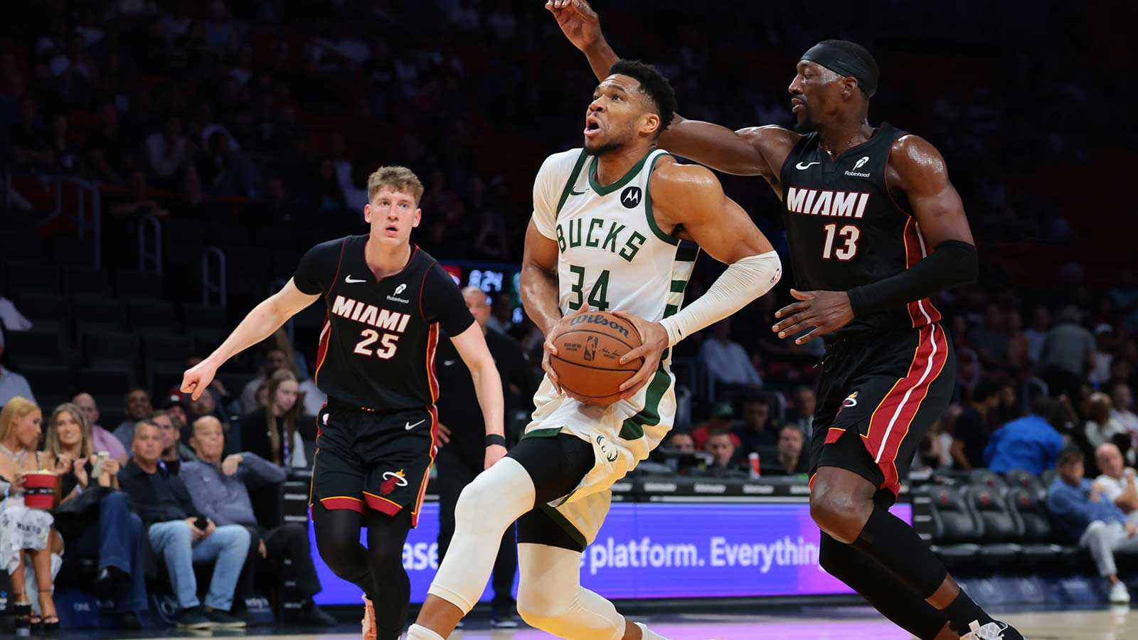 Milwaukee Bucks forward Giannis Antetokounmpo (34) drives to the basket against Miami Heat center Bam Adebayo (13) during the first quarter at Kaseya Center. 