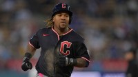 Cleveland Guardians third baseman Jose Ramirez (11) rounds the bases after hitting a two-run home run in the eighth inning against the Los Angeles Dodgers at Dodger Stadium.