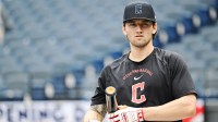 Cleveland Guardians designated hitter Chase DeLauter (24) watches during batting practice before the game between the Guardians and the Chicago Cubs at Progressive Field.