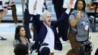 UConn Huskies head coach Dan Hurley celebrates after defeating the Illinois Fighting Illini in a semifinal of the Final Four of the men's 2026 NCAA Tournament at Lucas Oil Stadium.