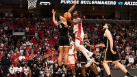 Arizona Wildcats guard Jaden Bradley (0) shoots against Purdue Boilermakers forward Trey Kaufman-Renn (4) in the second half during an Elite Eight game of the West Regional of the men's 2026 NCAA Tournament at SAP Center.