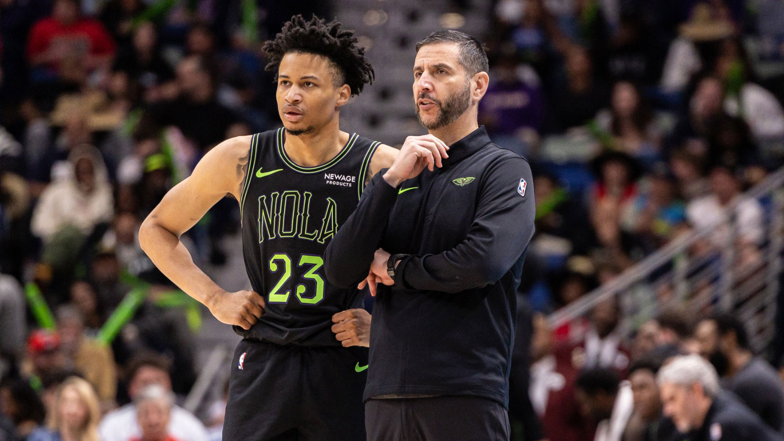 New Orleans Pelicans Interim Head Coach James Borrego talks to guard Trey Alexander (23) against the Orlando Magic during the second half at Smoothie King Center.