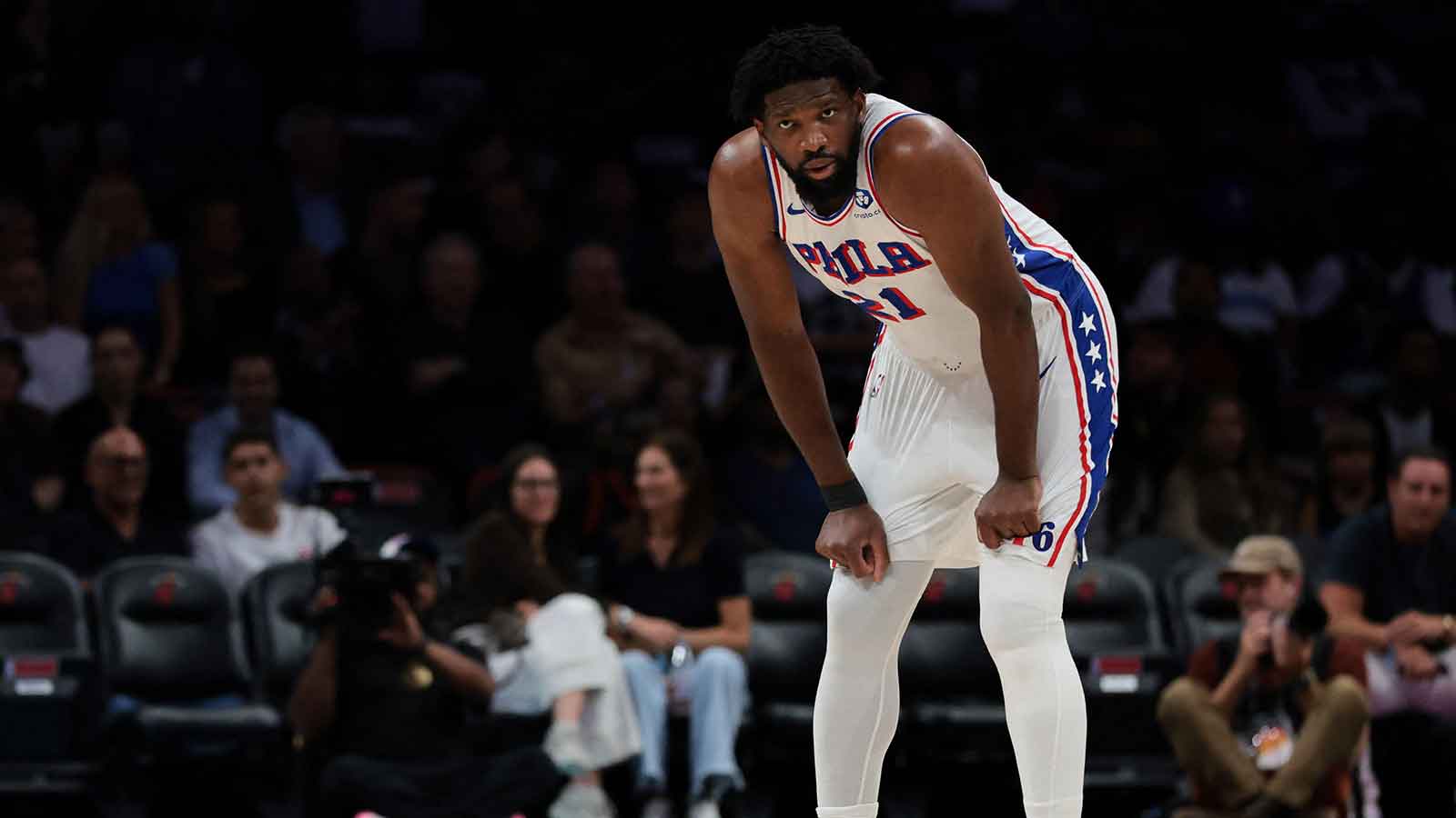 Philadelphia 76ers center Joel Embiid (21) looks on against the Miami Heat during the first quarter at Kaseya Center.
