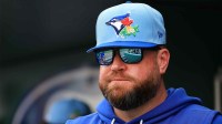Toronto Blue Jays manager John Schneider (14) looks on during the third inning against the Boston Red Sox at JetBlue Park at Fenway South