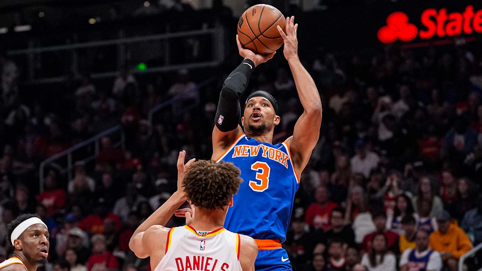 Apr 25, 2026; Atlanta, Georgia, USA; New York Knicks guard Josh Hart (3) shoots over Atlanta Hawks guard Dyson Daniels (5) during the first half at State Farm Arena.