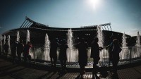 Fans cool down near the fountains at Kauffman Stadium prior to a game between the Kansas City Royals and the New York Mets.