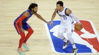 Knicks' Jalen Brunson (13) dribbles the ball while defended by Detroit Pistons guard Derrick Rose (25) during the first half at Mexico City Arena