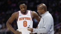 Knicks head coach Mike Brown talks to forward OG Anunoby