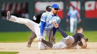 Minnesota Twins second baseman Kody Clemens (2) is tagged out at second base by Kansas City Royals shortstop Bobby Witt Jr. (7) during the fifth inning at Kauffman Stadium.
