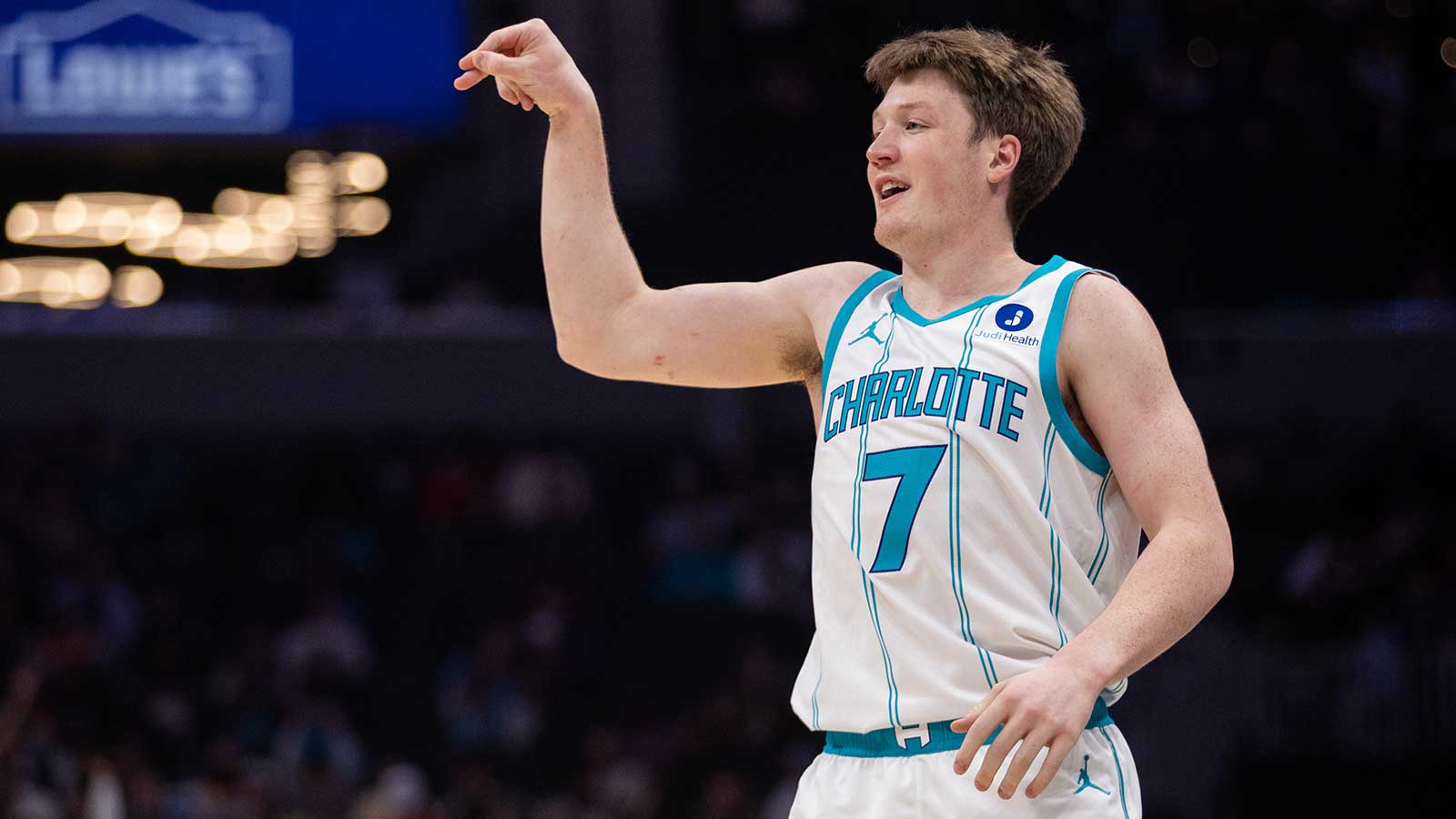 Charlotte Hornets guard Kon Knueppel (7) celebrates a three point basket against the Portland Trail Blazers during the first quarter at Spectrum Center. 