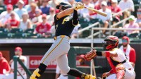 Pittsburgh Pirates shortstop Konnor Griffin (75) hits a two-run home run against the St. Louis Cardinals during the first inning at Roger Dean Chevrolet Stadium.