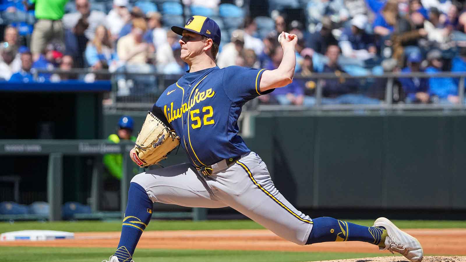 Milwaukee Brewers starting pitcher Kyle Harrison (52) delivers a pitch against the Milwaukee Brewers during the first inning at Kauffman Stadium. 