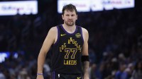 Lakers guard Luka Doncic (77) reacts after a play against the Oklahoma City Thunder during the second half at Paycom Center