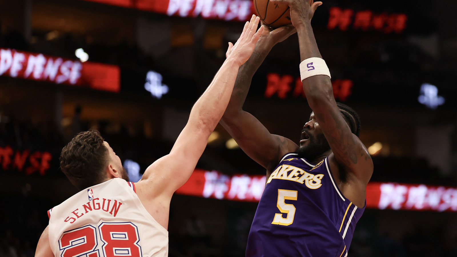 Mar 18, 2026; Houston, Texas, USA; Los Angeles Lakers center Deandre Ayton (5) shoots against Houston Rockets center Alperen Sengun (28) in the second half at Toyota Center