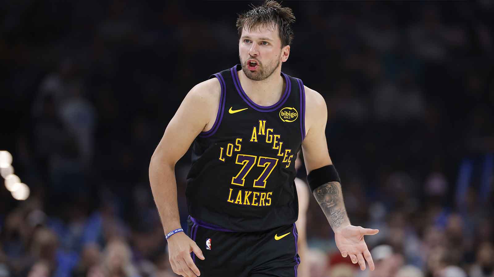 Lakers guard Luka Doncic (77) reacts after a play against the Oklahoma City Thunder during the second half at Paycom Center