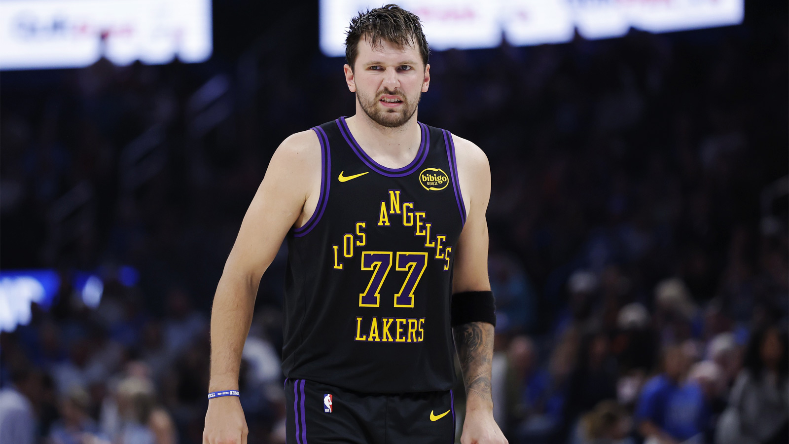 Lakers guard Luka Doncic (77) reacts after a play against the Oklahoma City Thunder during the second half at Paycom Center