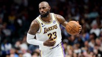 Los Angeles Lakers forward LeBron James (23) controls the ball against the Dallas Mavericks during the second half at American Airlines Center.