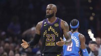Los Angeles Lakers forward LeBron James (23) reacts after a call against hindering a play against the Oklahoma City Thunder in the first quarter at Paycom Center.