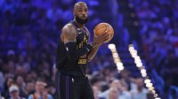 Los Angeles Lakers forward LeBron James (23) moves the ball down the court against the Oklahoma City Thunder during the first quarter at Paycom Center.