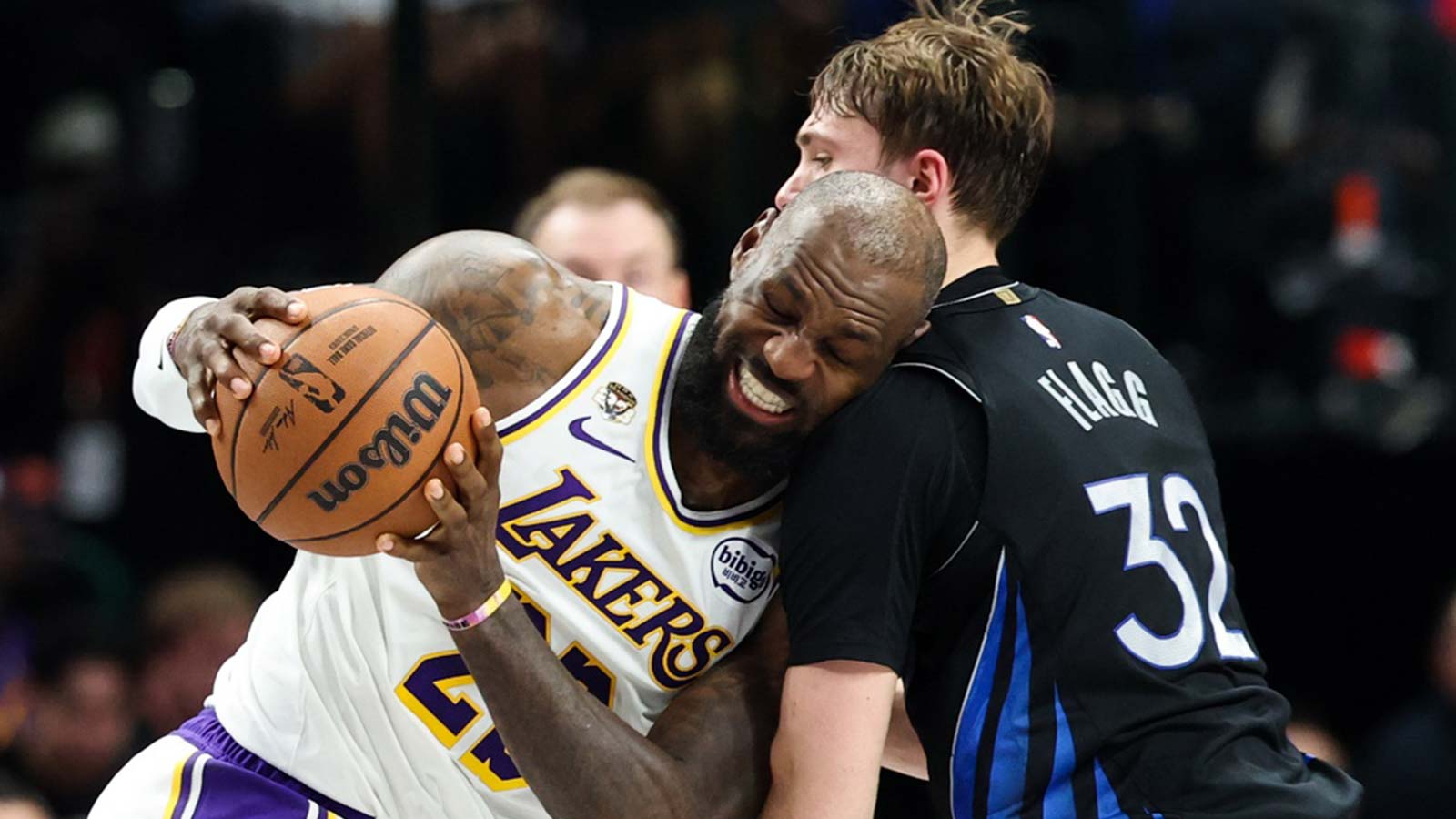 Los Angeles Lakers forward LeBron James (23) drives to the basket as Dallas Mavericks forward Cooper Flagg (32) defends during the first half at American Airlines Center.