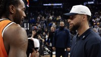 Los Angeles Clippers forward Kawhi Leonard (left) greets Golden State Warriors guard Stephen Curry (30) following their game during at Chase Center.