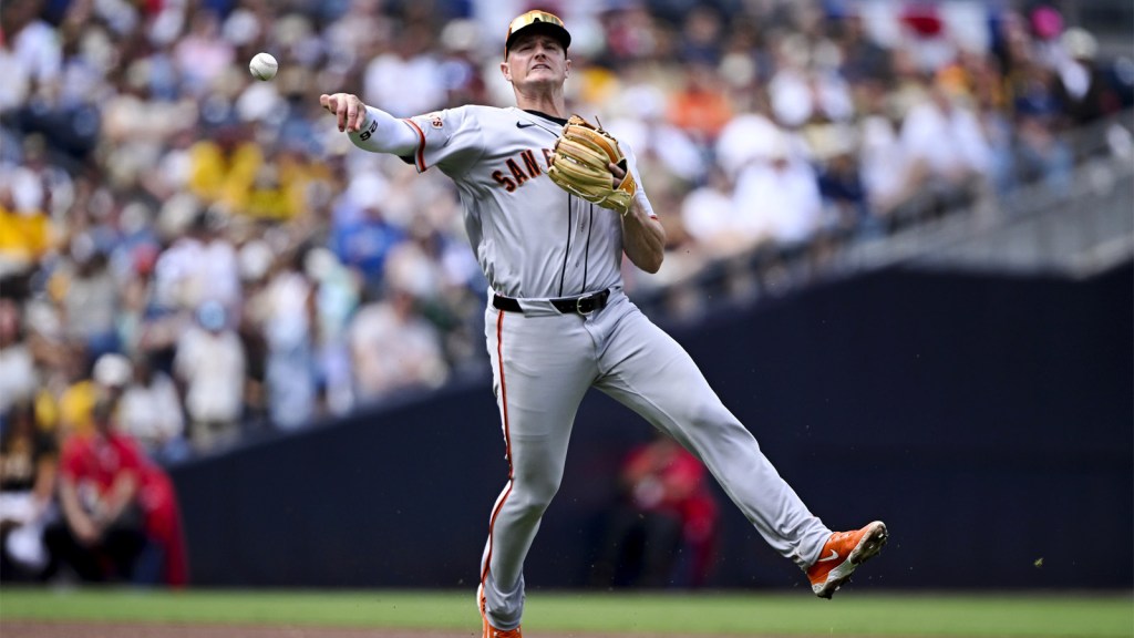 San Francisco Giants third baseman Matt Chapman (26) throws to first base but can’t get the out on San Diego Padres shortstop Xander Bogaerts (2) during the fifth inning at Petco Park.
