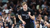 Mavericks forward Cooper Flagg celebrates