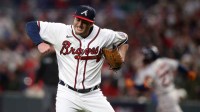 Atlanta Braves relief pitcher Luke Jackson (77) reacts to the third out of the eighth inning of game four of the 2021 World Series against the Houston Astros at Truist Park.