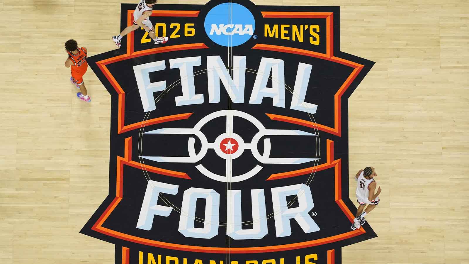 Illinois Fighting Illini guard Keaton Wagler (23) walks off the court after losing to the UConn Huskies during a semifinal of the Final Four of the men's 2026 NCAA Tournament at Lucas Oil Stadium.