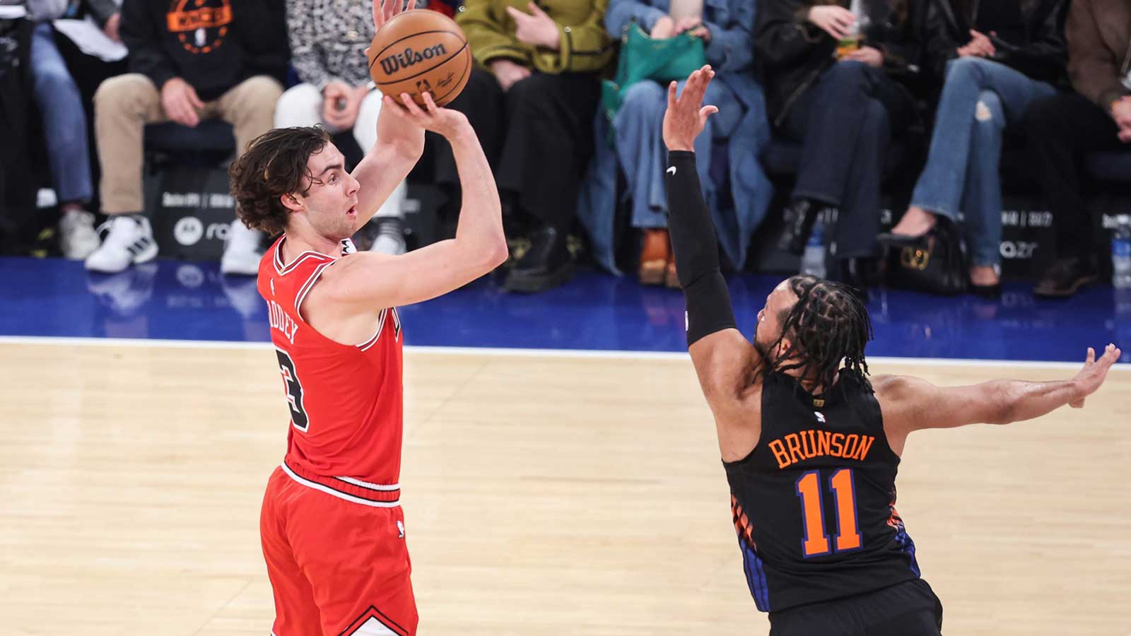 Chicago Bulls guard Josh Giddey (3) takes a three-point shot past New York Knicks guard Jalen Brunson (11) in the first quarter at Madison Square Garden.