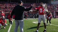 Ohio State Buckeyes head coach Ryan Day shakes hands with linebacker Sonny Styles during senior day festivities prior to the NCAA football game against the Rutgers Scarlet Knights at Ohio Stadium in Columbus on Nov. 22, 2025.
