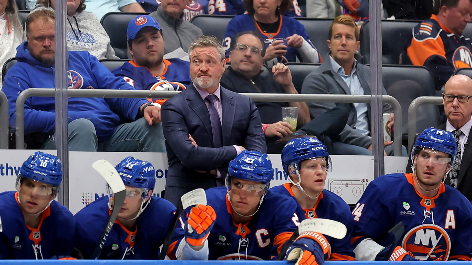 New York Islanders head coach Patrick Roy and players on the bench react during the third period against the Pittsburgh Penguins at UBS Arena.