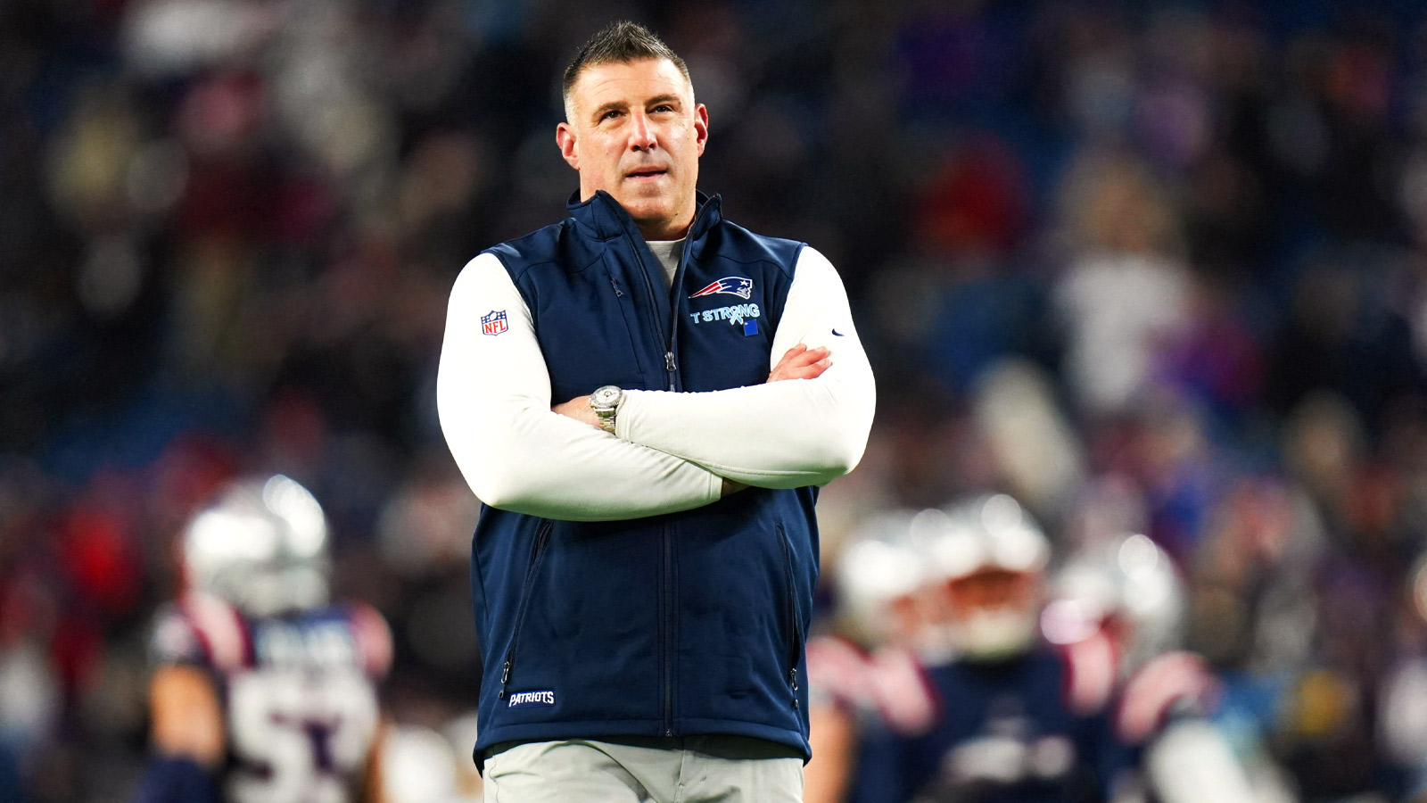 New England Patriots head coach Mike Vrabel looks on before the game against the Los Angeles Chargers in an AFC Wild Card Round game at Gillette Stadium.